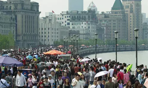 बारिश के मौसम में शंघाई में पारा बढ़ा