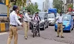 यातायात पुलिस कर्मचारियों को ‘टोपी पहनना अनिवार्य