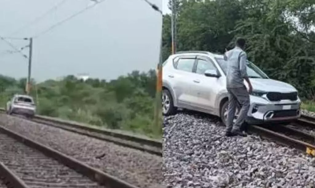 यूपी की महिला ने तेलंगाना में किया बड़ा खेल, रेलवे ट्रैक पर कार दौड़ाती आई नजर, वीडियो हो रहा वायरल यूपी की महिला ने तेलंगाना में किया बड़ा खेल, रेलवे ट्रैक पर कार दौड़ाती आई नजर, वीडियो हो रहा वायरल