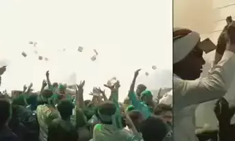 बीड़ में पत्नी की जीत पर पति ने हवा में उड़ाए नोट